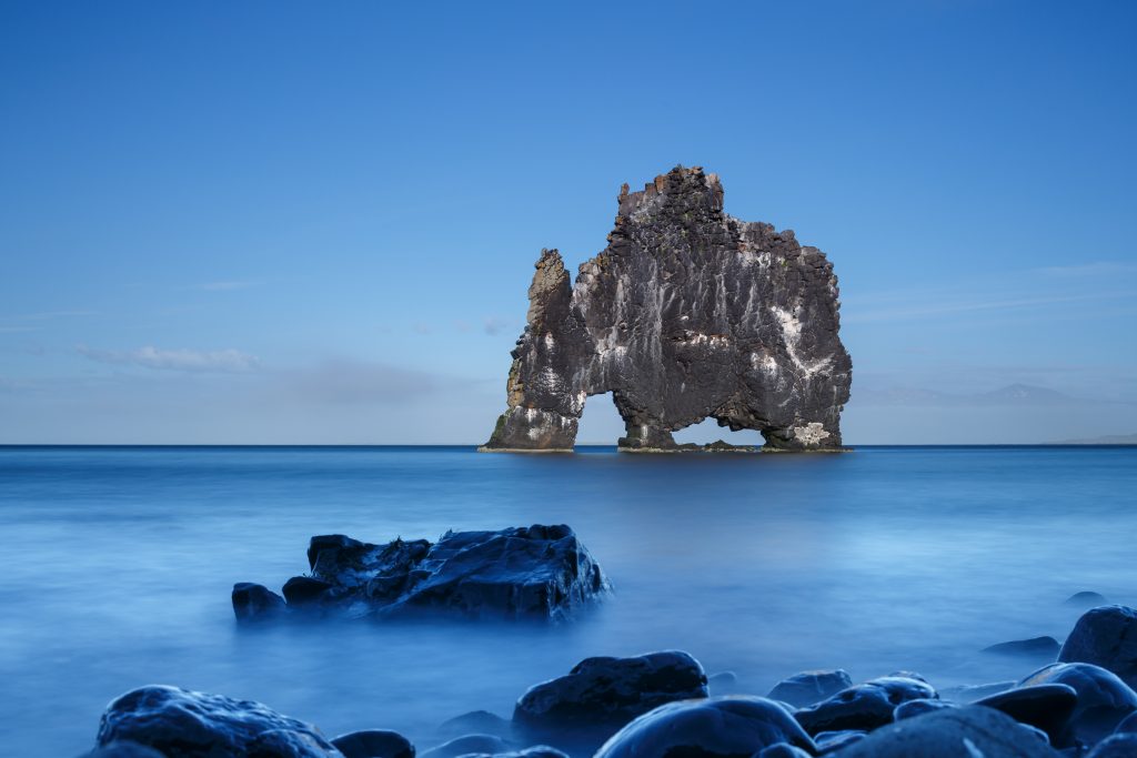 intriguing gray rock formation in the ocean best things to do in Iceland