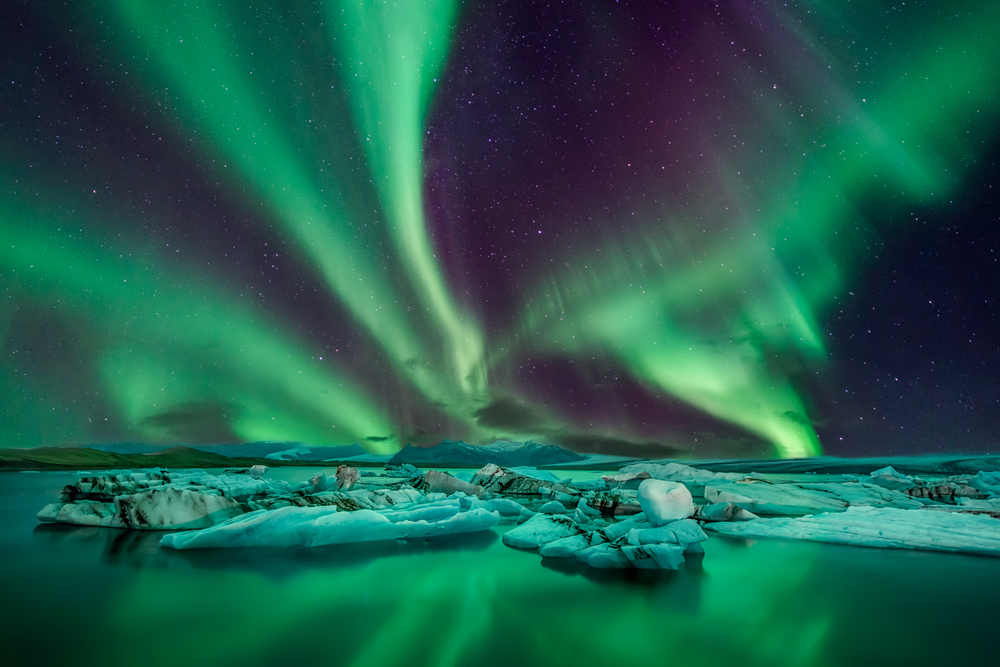 Camping in Iceland during winter with Northern Lights.