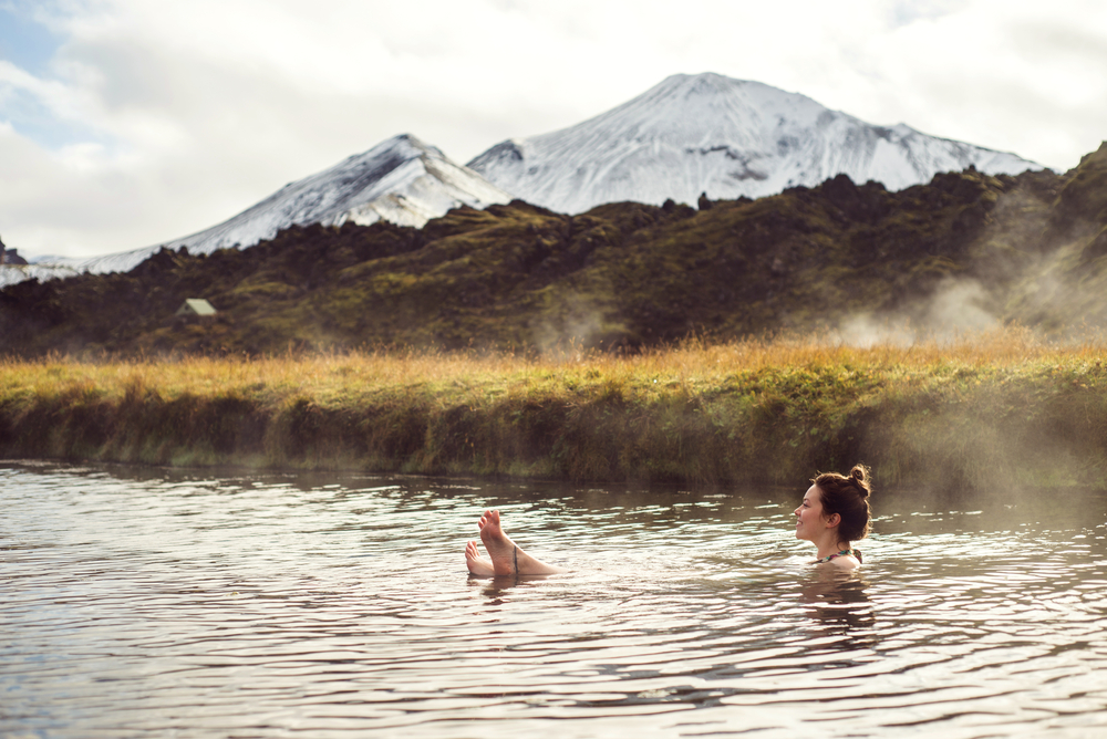 photo of a women in Landmannalaugar, a natural hot bath in one of the national parks in iceland