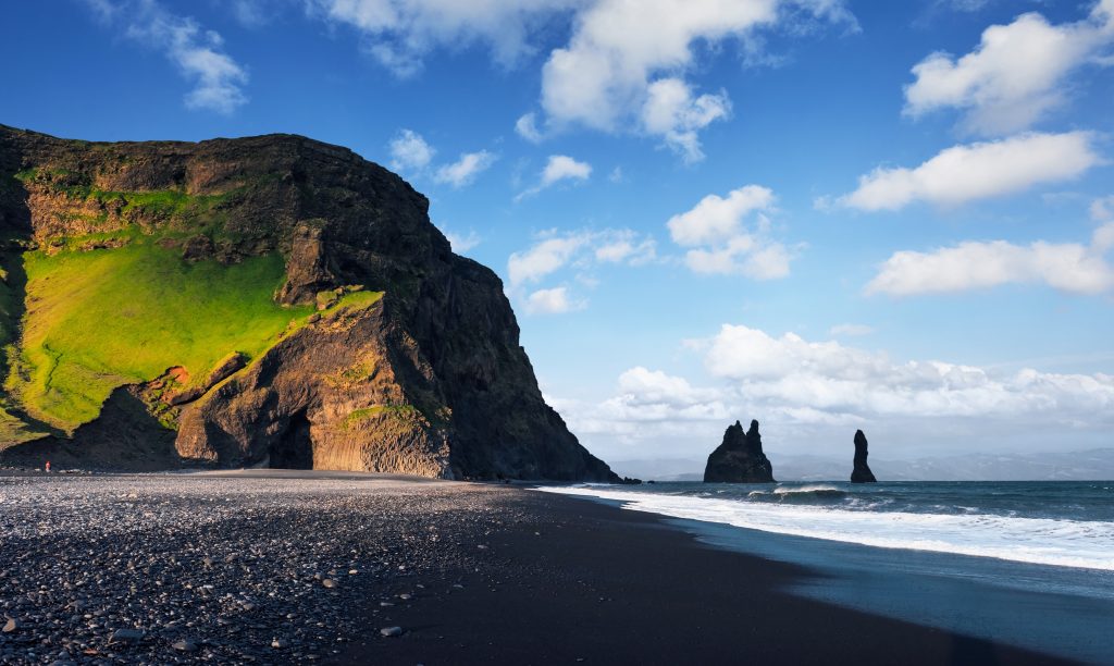 Photo of Reynisfjara Beach which is one of the amazing beaches in Iceland and it is located close to Vik.