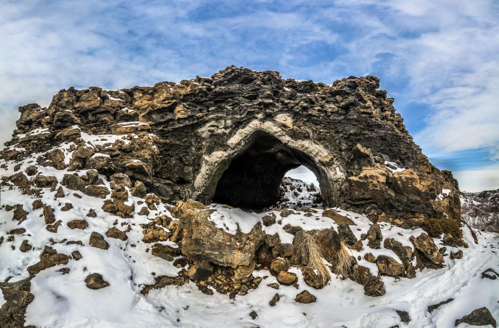 Photo of Dimmuborgir which is a frozen lava field located close to Lake Mývatn. It is one of the Game of Thrones Iceland filming locations. 