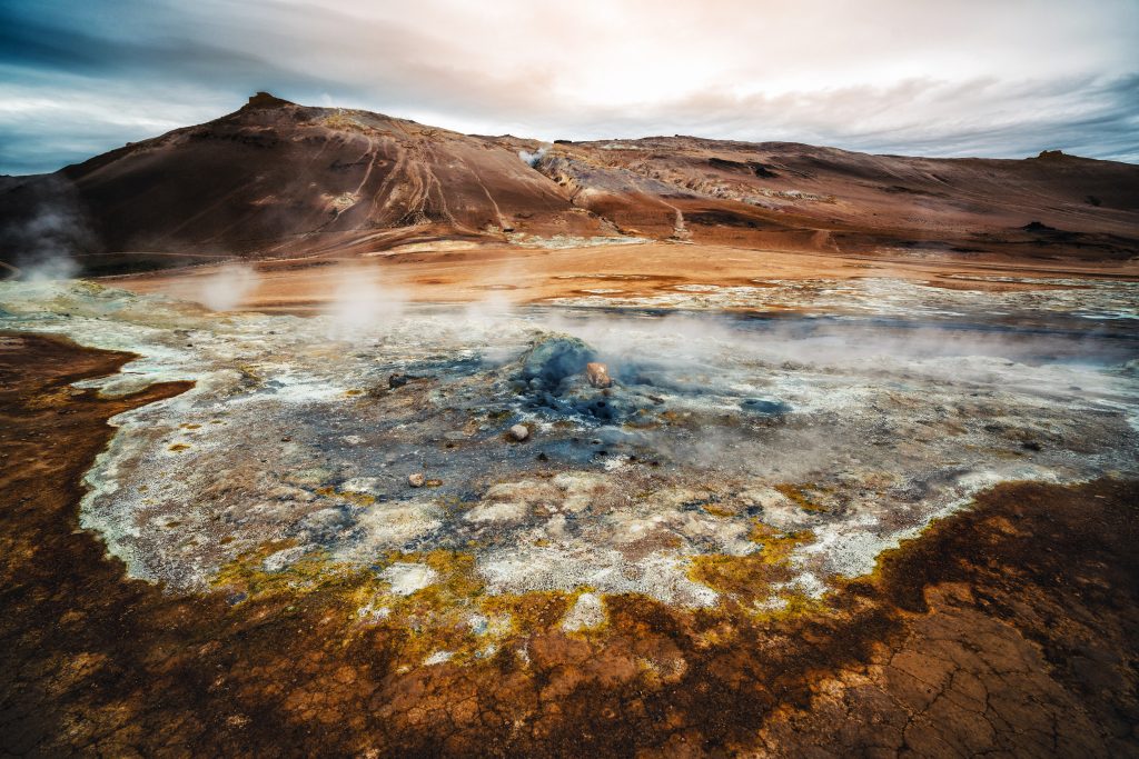 Photo of Hverir which is a geothermal spring that is located at the foot of Namafjall Mountain in Iceland. It is one of the Game of Thrones Iceland shooting locations. 