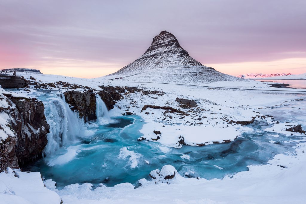 Photo of snow covered Kirkjufell Mountain located in Iceland. 