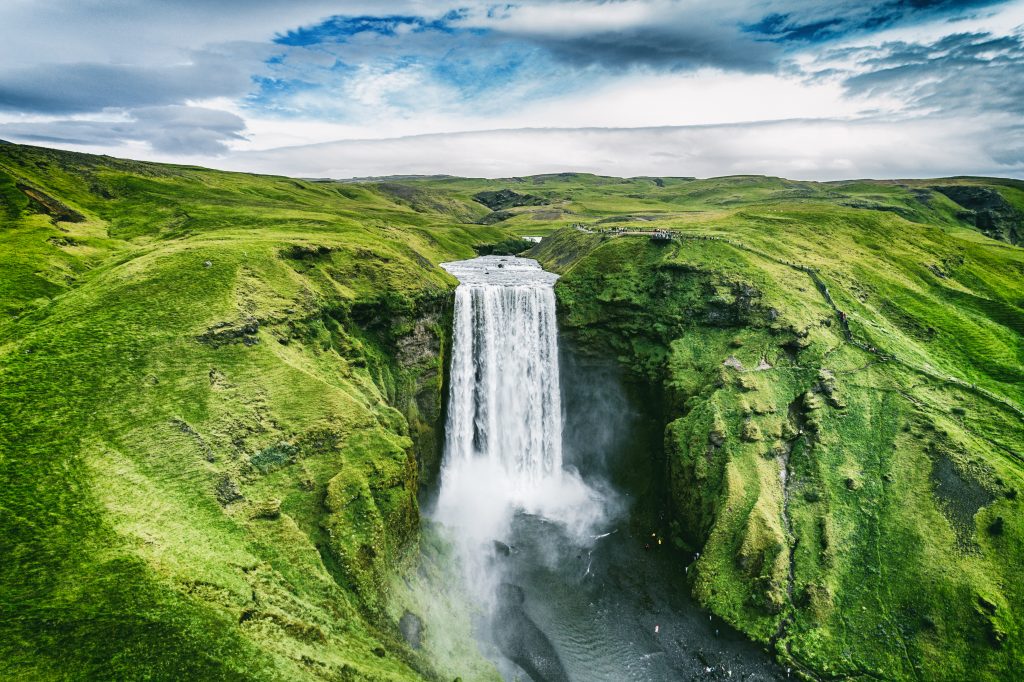 Photo of Skógafoss which is one of the biggest waterfalls in Iceland and a Game of Thrones Iceland filming location.