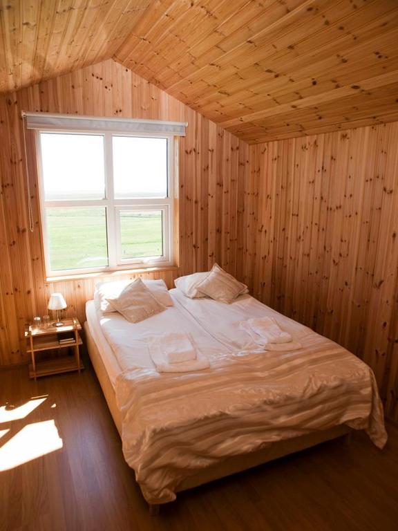 Photo of guest room at Guesthouse Nypugardar which is located in Iceland and is one of the best Hofn Hotels. 