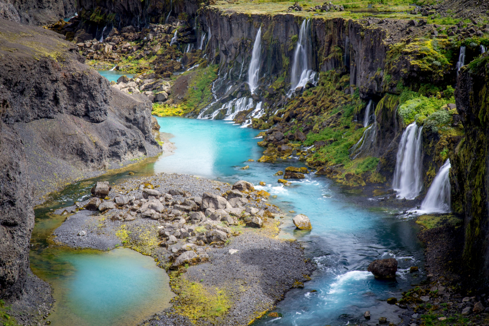 Sigoldugljufur a photographers dream with vivid blue water and multiple cascades