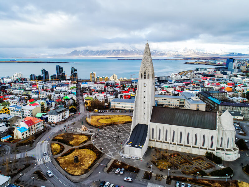 Aerial view of the Hallgrimskirka church standing tall above Reykjavik. 