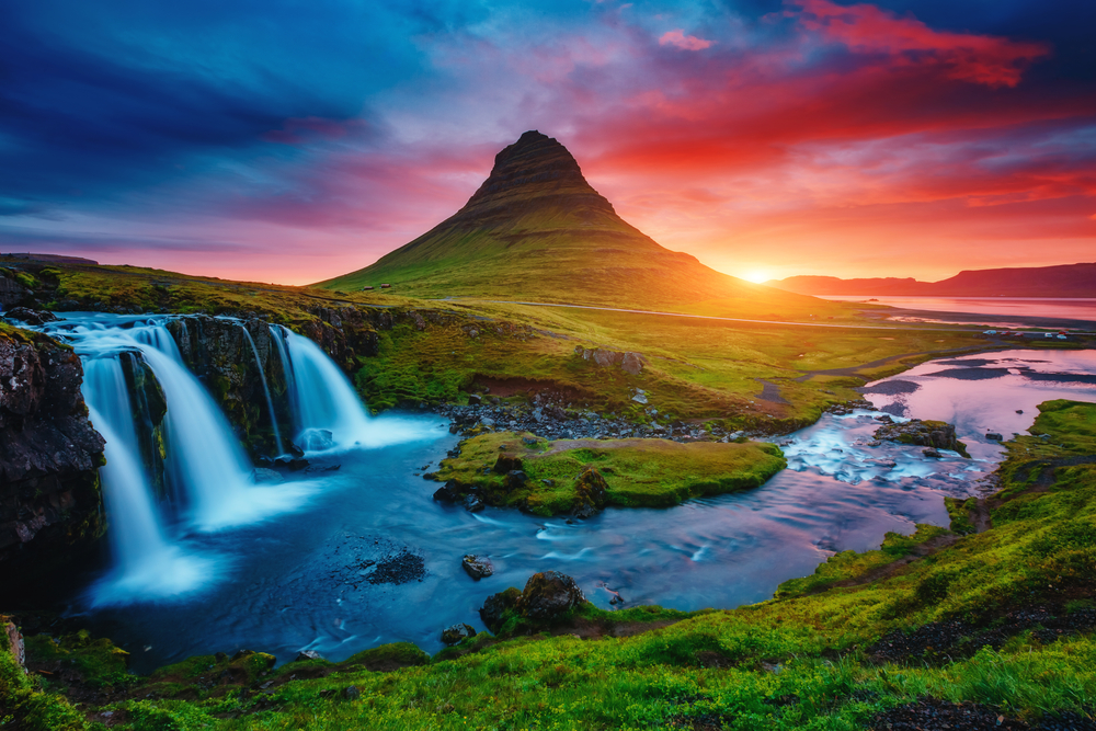 Snaefellsnes Peninsula at sunrise with a waterfall in the foreground and Kirkjufell in the background.