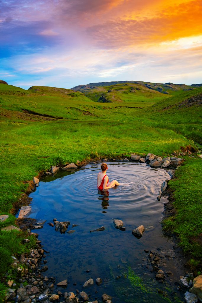 hrunalaug hot springs at sunset