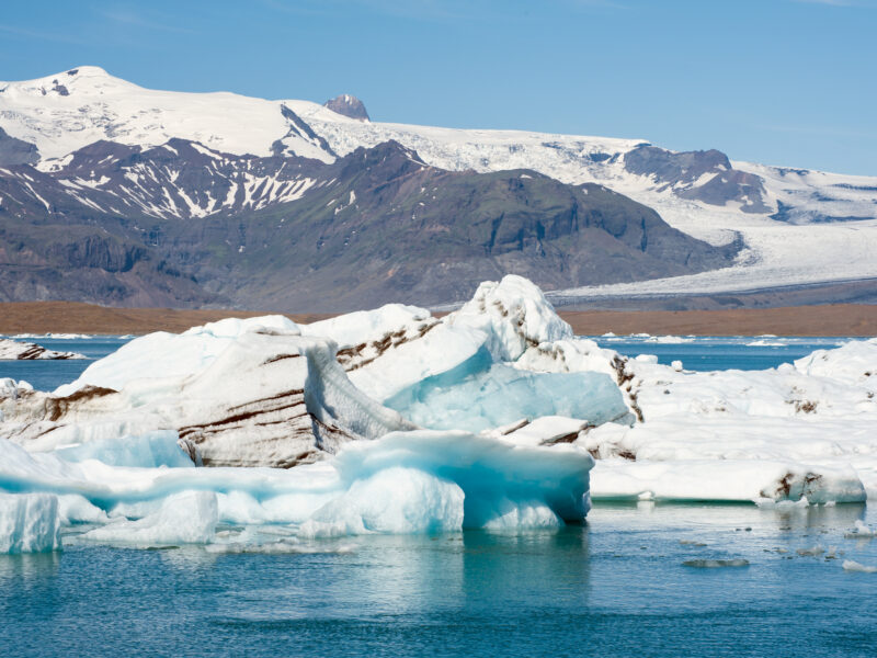 icebergs with Volcanic ash running through