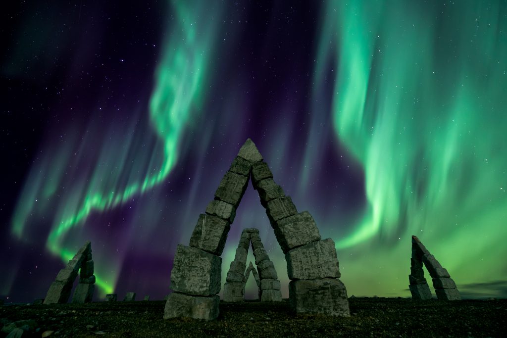 northern lights over arctic henge north iceland