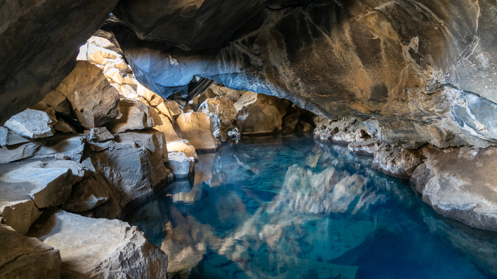 crystal clear water in grotagja cave in north iceland