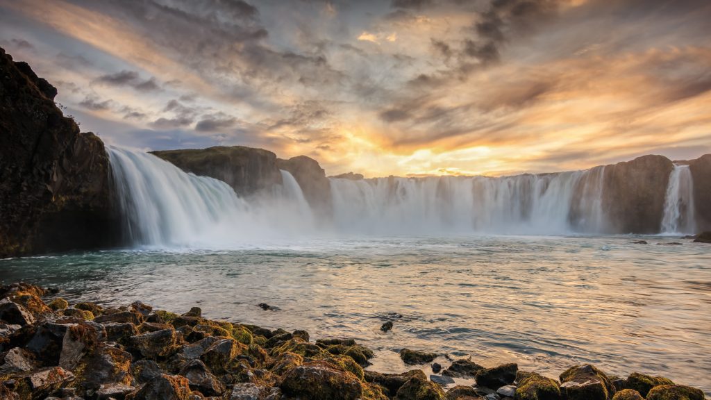 north iceland waterfall at sunset