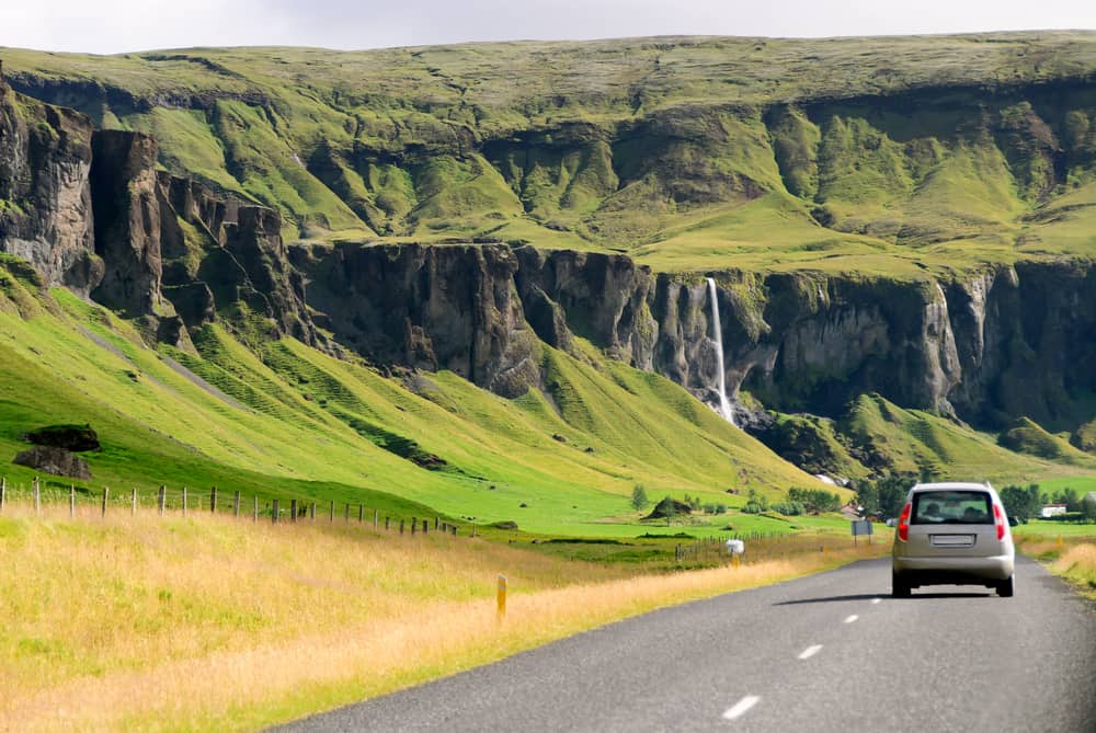 car driving along an icelandic road