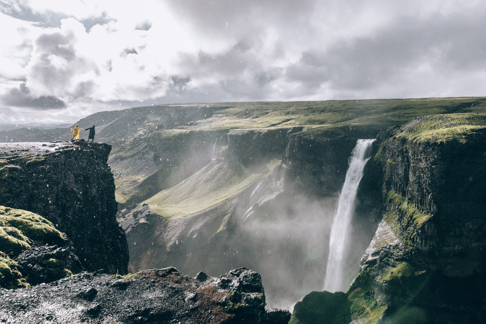 Photo of couple at waterfall.