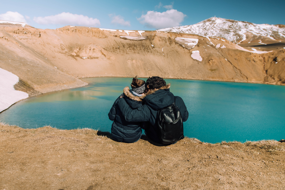 Photo of couple by Krafla crater in Iceland.