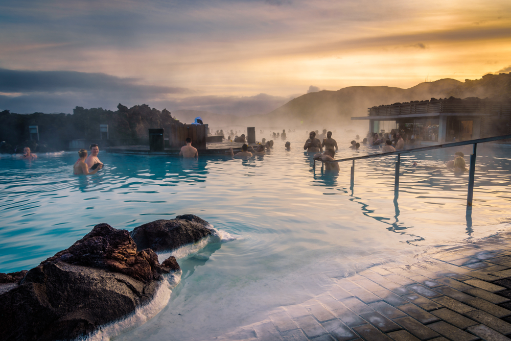 people relaxing at The Blue Lagoon at sunset