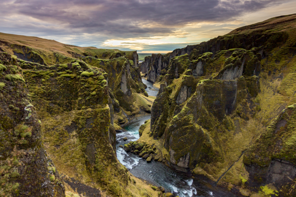 Looking down into rugged Fjadrargljufur Canyon during sunset.