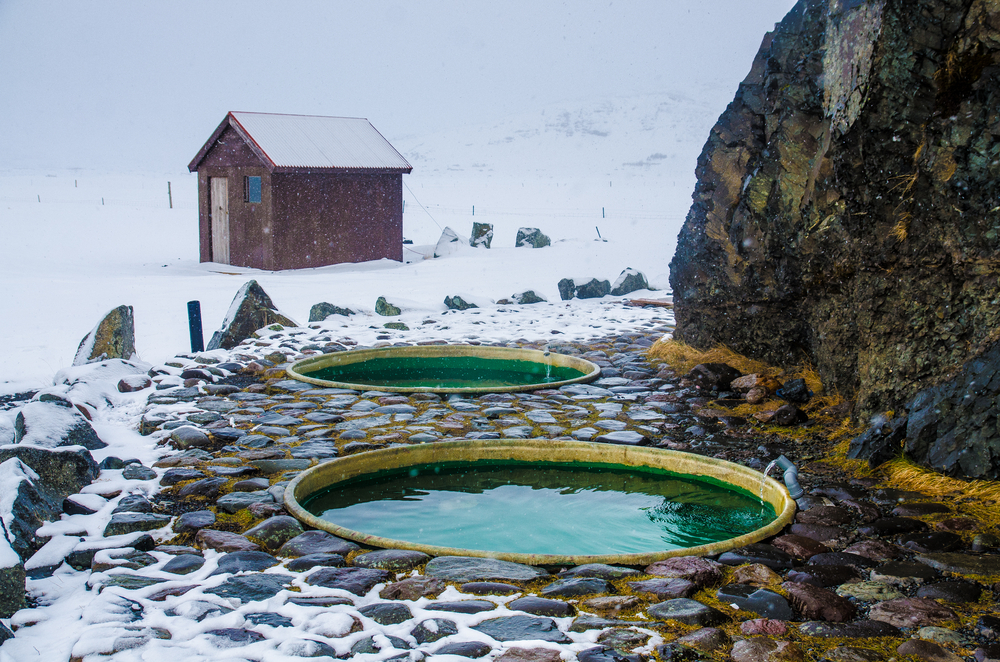 Two round Hoffell Hot Tubs on a snowy day.