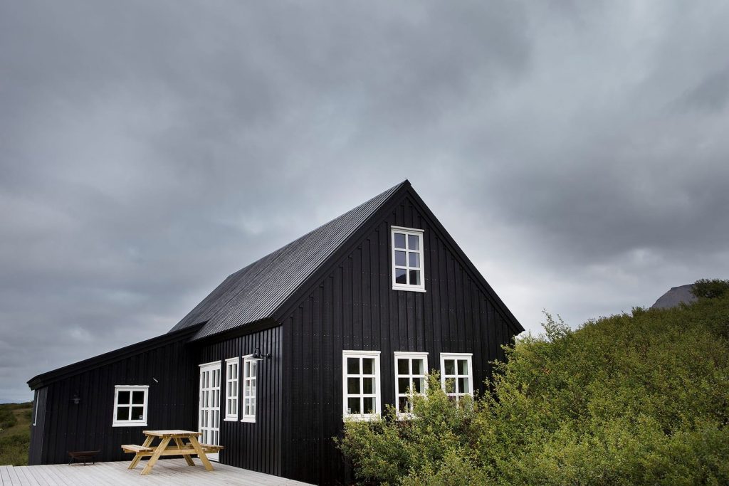 traditional black timber house airbnb in Iceland