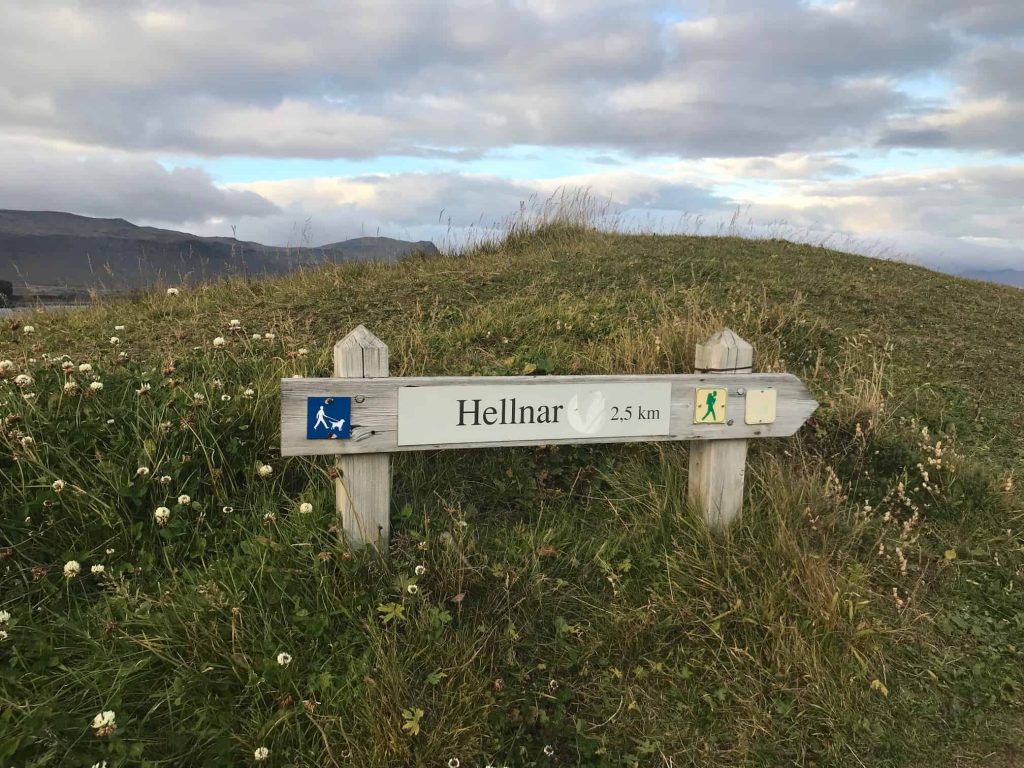 hiking post saying 2.5 kilometers to Hellnar in Snaefellsnes Peninsula Iceland