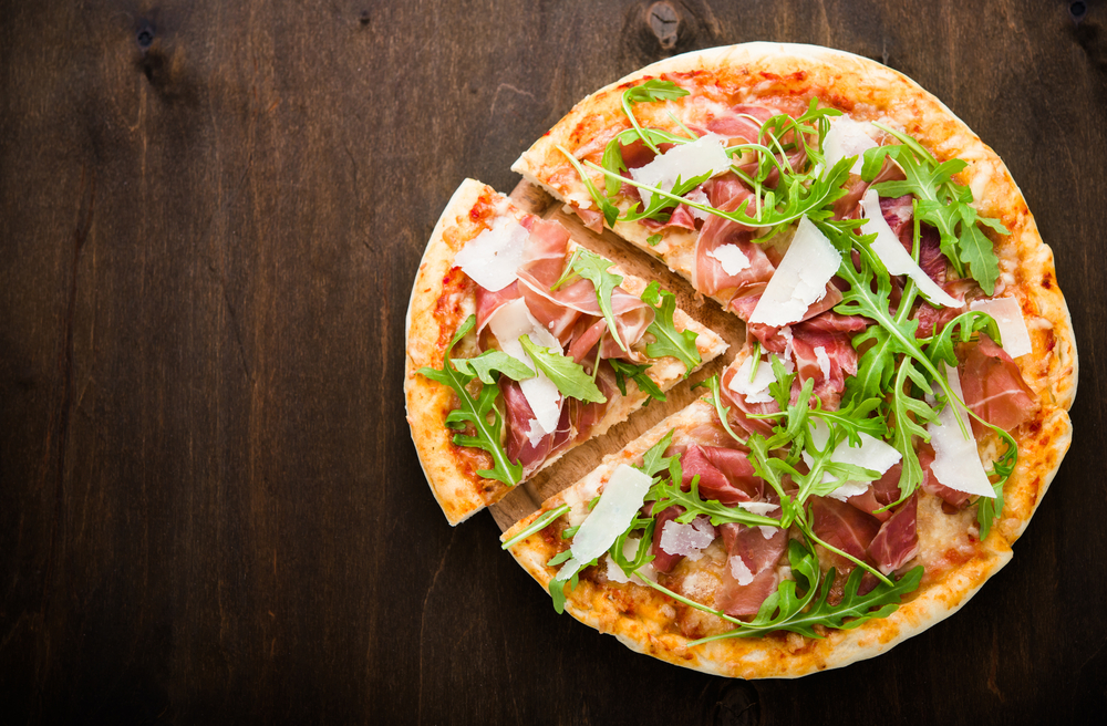 delicious thin crust pizza with parma ham and arugula like you can find at Eldofninn in Reykjavik