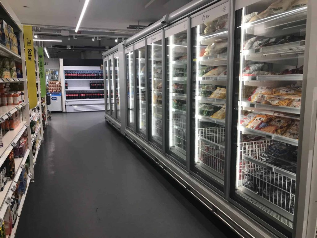 the frozen food isle of a grocery store in iceland