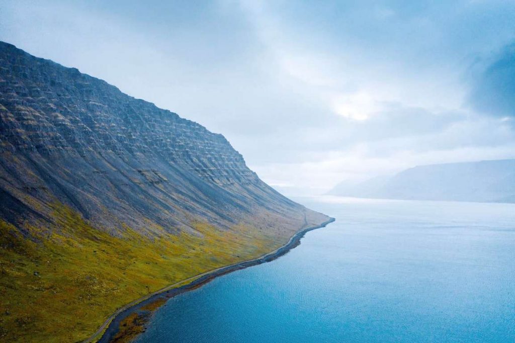 drone image of the westfjords in iceland on a moody day