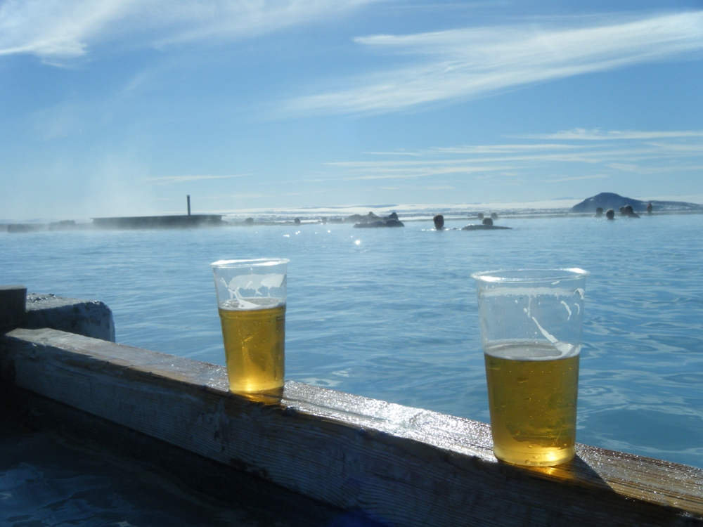 two beer glasses sitting on a ledge at the Myvatn Nature Baths in the north of Iceland