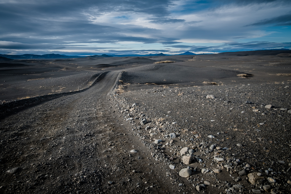 Rocky f-road in Iceland stretching into the distance.