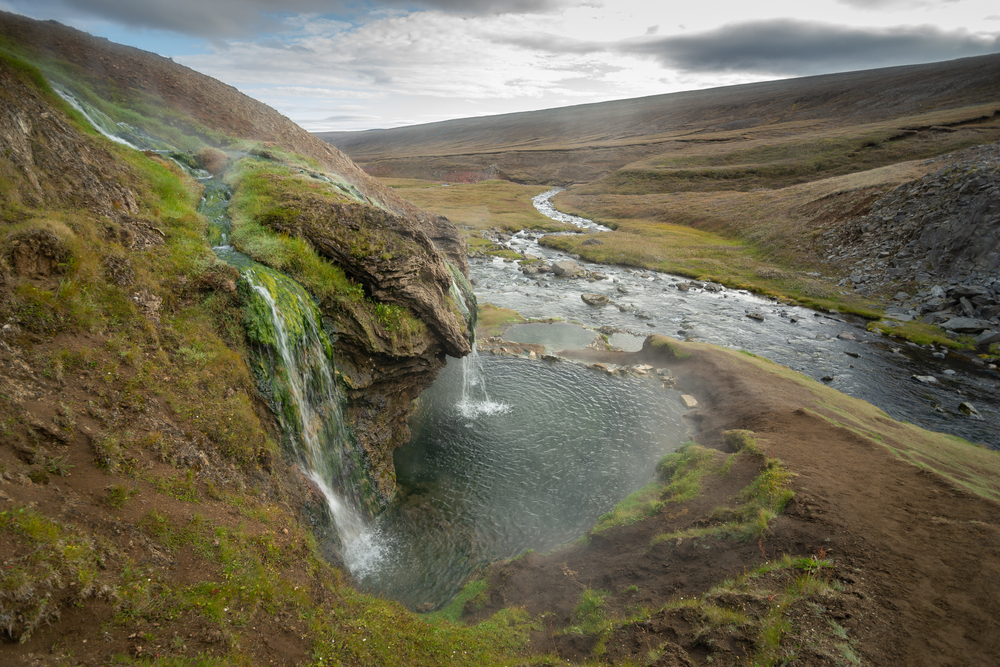 Waterfalls flowing into Laugavallalaug Hot Springs.