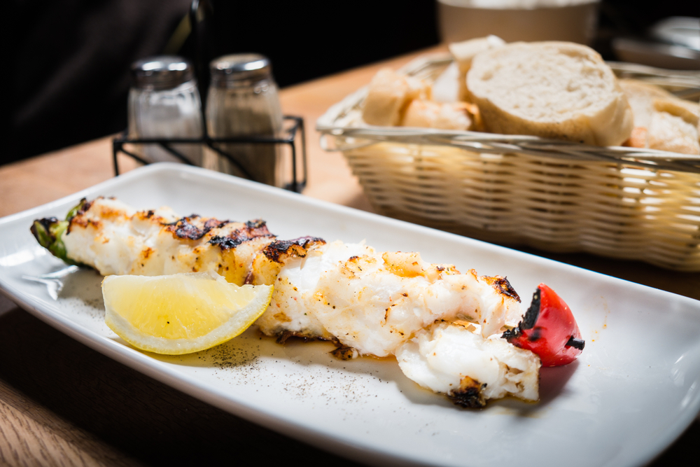 Grilled Fish on a plate in an article about restaurants in Iceland