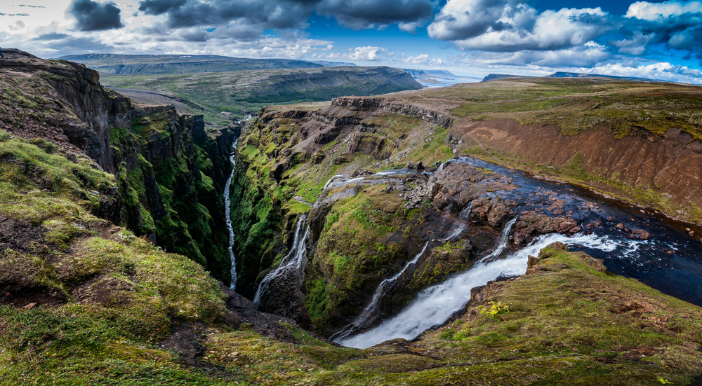 The Glymur waterfalls are gorgeous, green and deep with steady flows of water.
