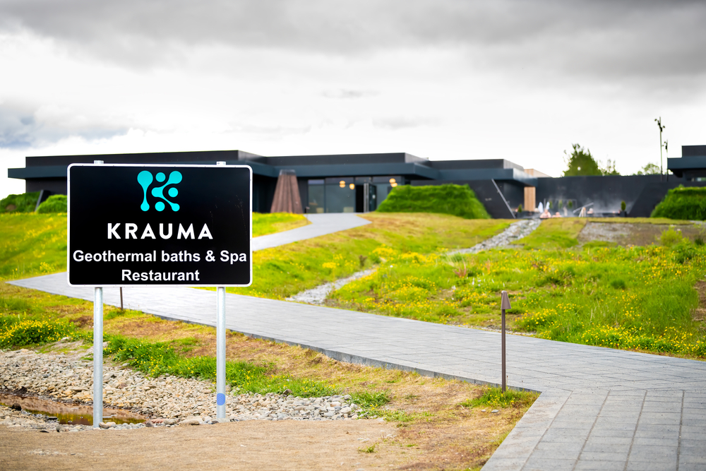 The welcoming sign to Krauma spa geothermal baths and restaurant. 