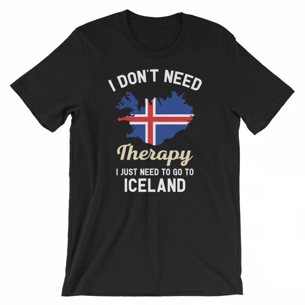 A black t-shirt that has a map of Iceland on it and says "I don't need therapy, I just need to go to Iceland."