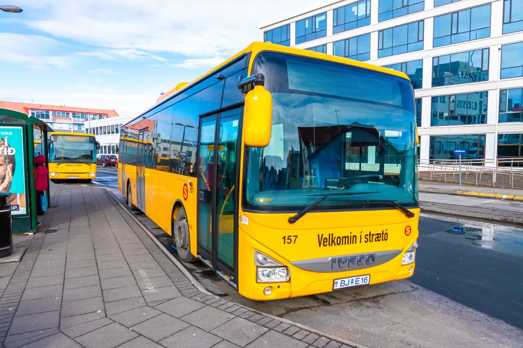 A Straeto public bus parked at a bus station