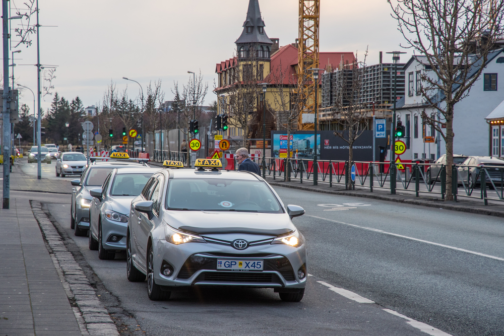 taxis lined up on a road in Reykjavik