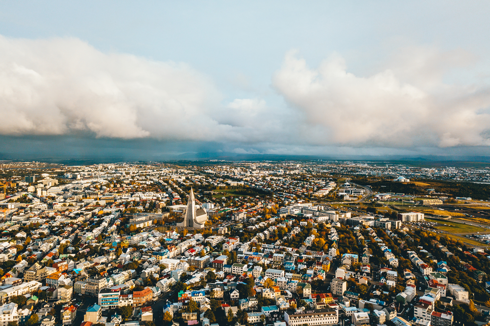 Aerial view of Reykjavik at golden hour, during one of the best tours in Iceland.