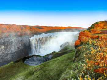Colorful sunset over Dettifoss waterfalls in Iceland