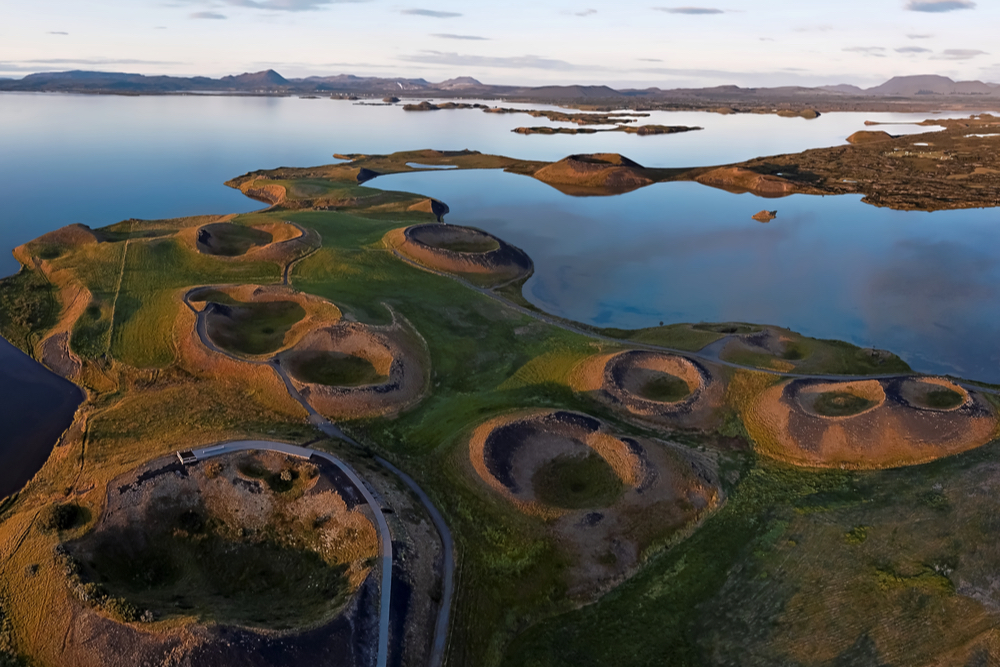 Vast expanse of Brown Craters and blue waters of Lake Mývatn used as Fast and Furious filming locations in Iceland
