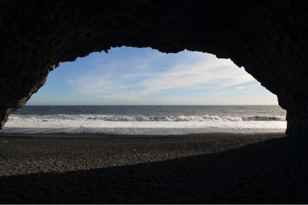 Hálsanefshellir sea cave made from Reynisfjara basalt rocks in Iceland from a volcanic explosion long ago