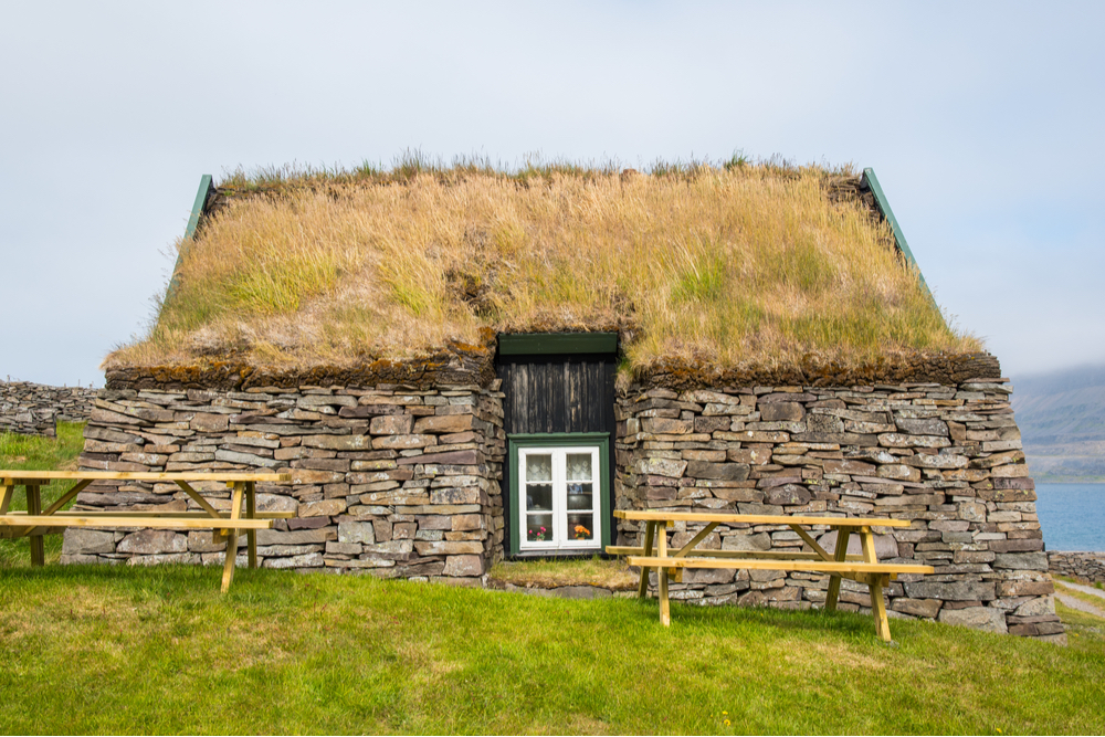 Sitting right by the sea, old Viking turf houses have moss and grass covered roofs and can be found in Litlibaer of Skotufjordur.