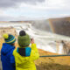 kids looking at gullfoss waterfall in iceland
