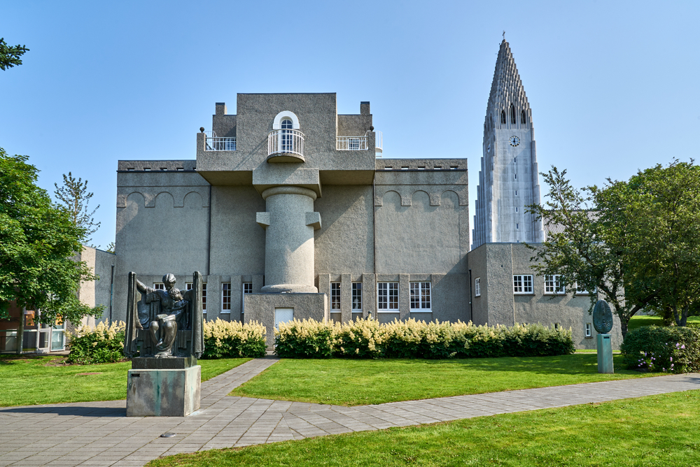  View of the back of the modernist Einar Jonsson Museum (1923) in Reykjavík Iceland. In the background on the right is the Hallgrímskirkja Tower.
