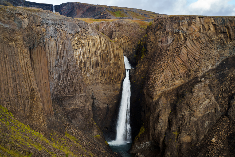 Litlanesfoss, one of the best waterfalls in east iceland flowing between walls of basalt columns