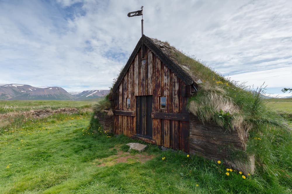 one of the many turf churches you ca nvisit with wooden walls and grass roof